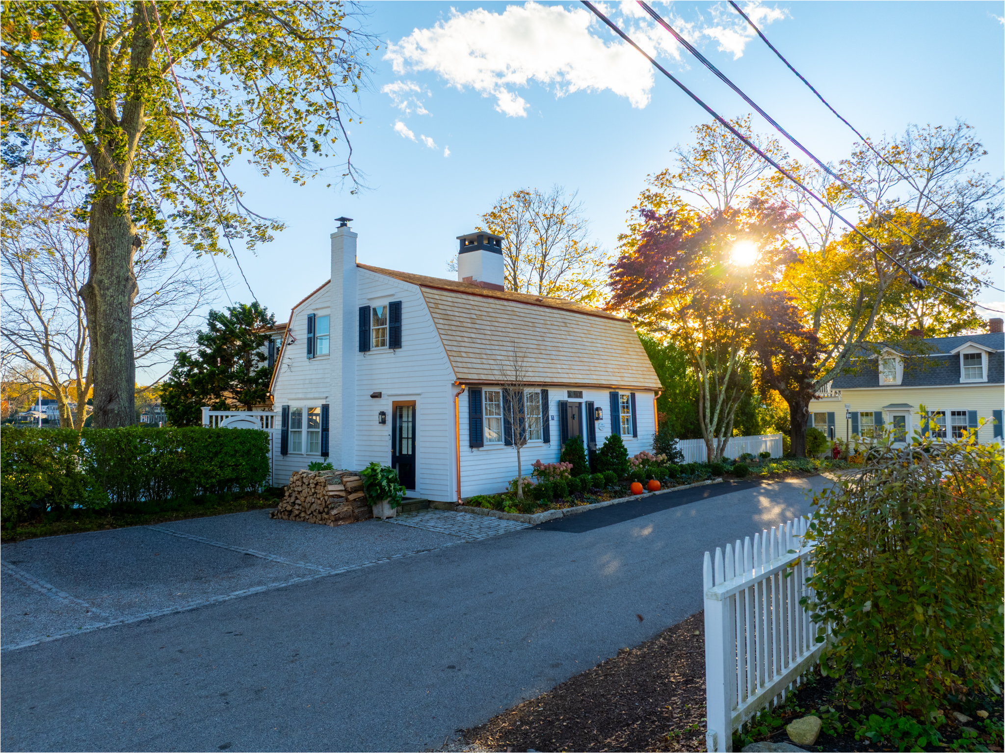 Photo of a colonial New England home at golden hour