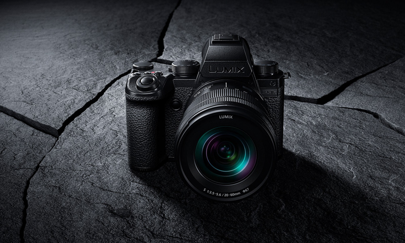 Panasonic Lumix S5II mirrorless camera on dramatic dark stone surface